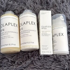 OLAPLEX Hair Care Collection with White and Cream Bottles